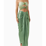 Woman wearing sage green ruched cutout maxi dress with metallic finish and strappy sandals — Baobab | Endless UAE