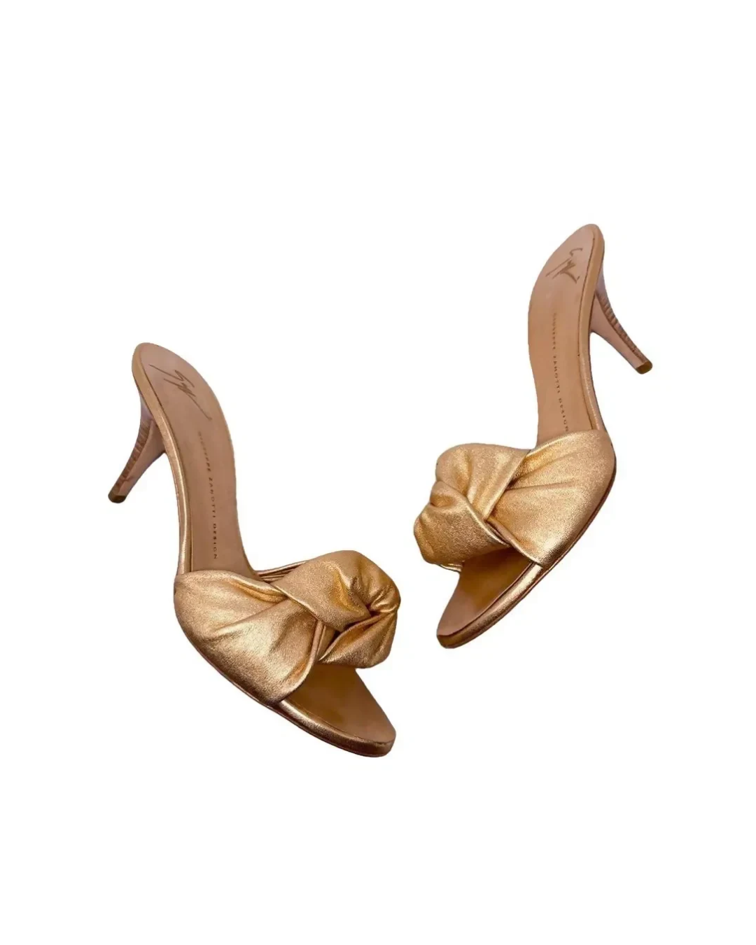 Gold twisted knot slide heels with thin stiletto heel — Giuseppe Zanotti | Endless UAE