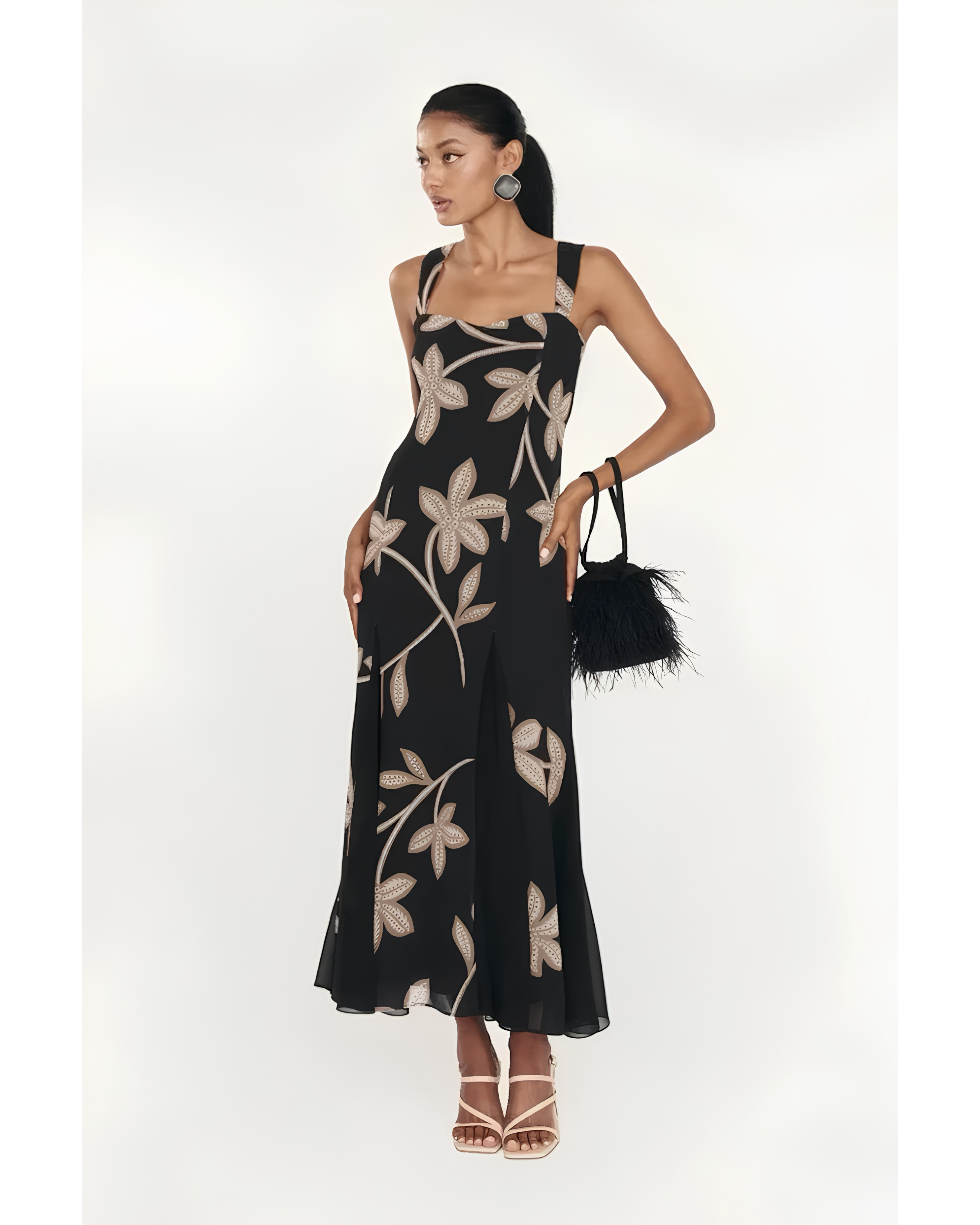 Woman wearing black Salima dress with white leaf embroidery and white shawl — Lady Pipa | Endless UAE