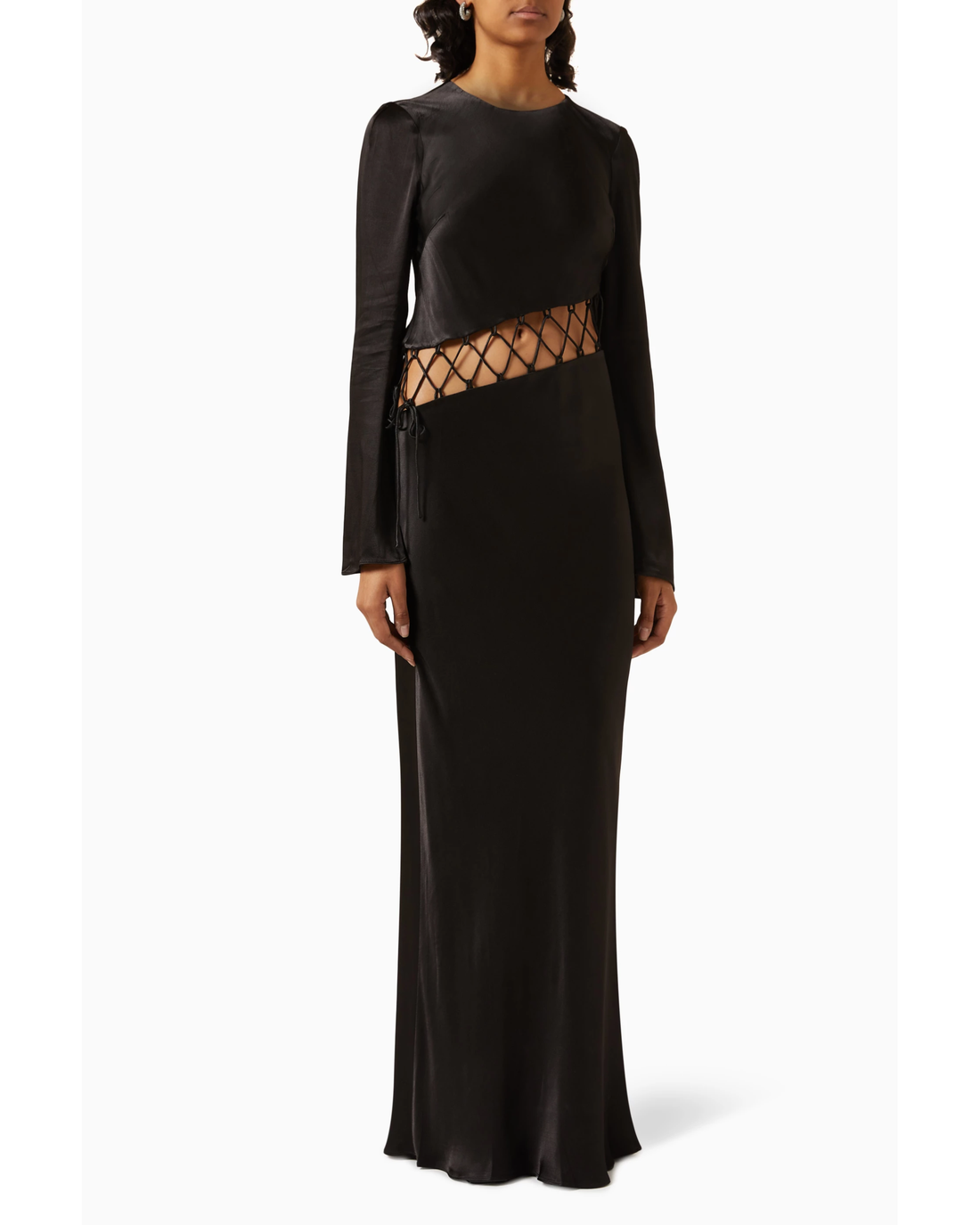 Black maxi dress with long sleeves and lattice cutout detail at waist, featuring asymmetrical design — Shona Joy | Endless UAE