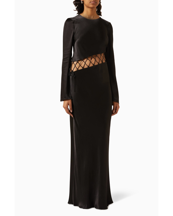Black maxi dress with long sleeves and lattice cutout detail at waist, featuring asymmetrical design — Shona Joy | Endless UAE