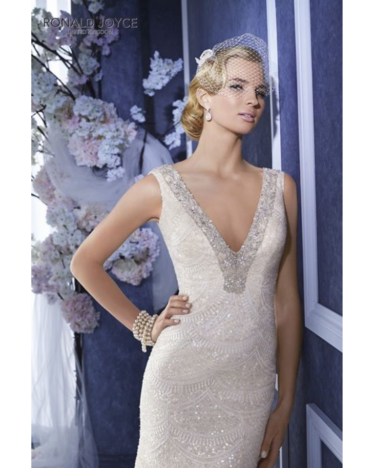 Elegant sleeveless beaded wedding gown with V-neckline and embellished straps in champagne ivory — Ronald Joyce | Endless UAE