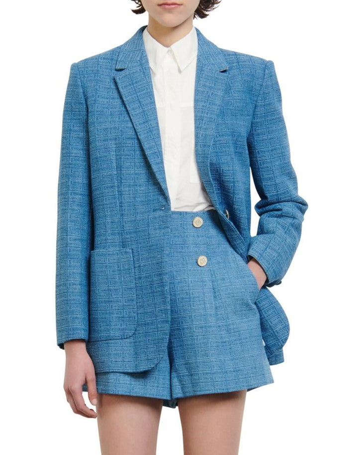 Blue geometric knit blazer worn with white shirt and burgundy boots — Sandro | Endless UAE