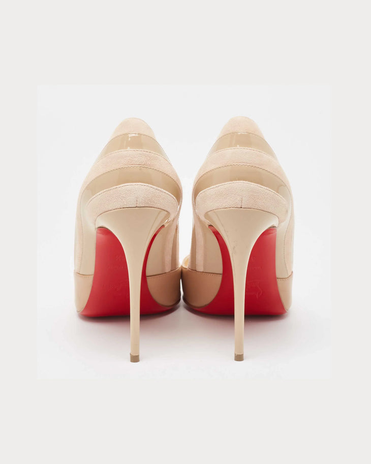Nude patent leather high heel pumps with signature red soles, rear view showing stiletto heels — Christian Louboutin | Endless UAE