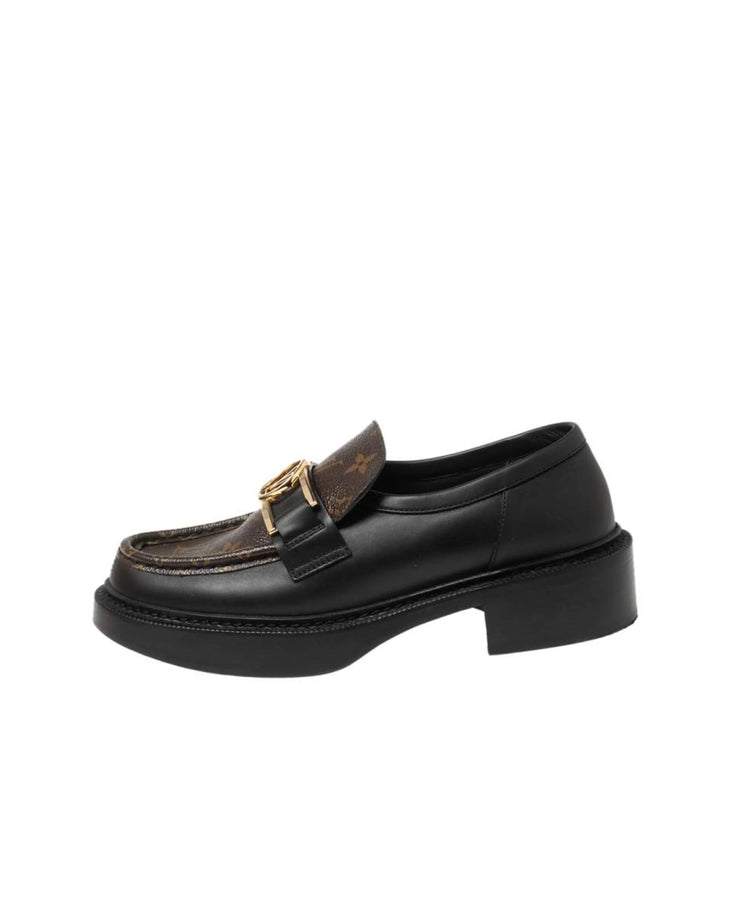Black leather loafers with monogram canvas accent and gold-tone LV hardware on chunky platform sole — Louis Vuitton | Endless UAE