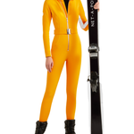 Bright yellow ski suit with belted waist and black turtleneck, paired with black skis — Cordova | Endless UAE