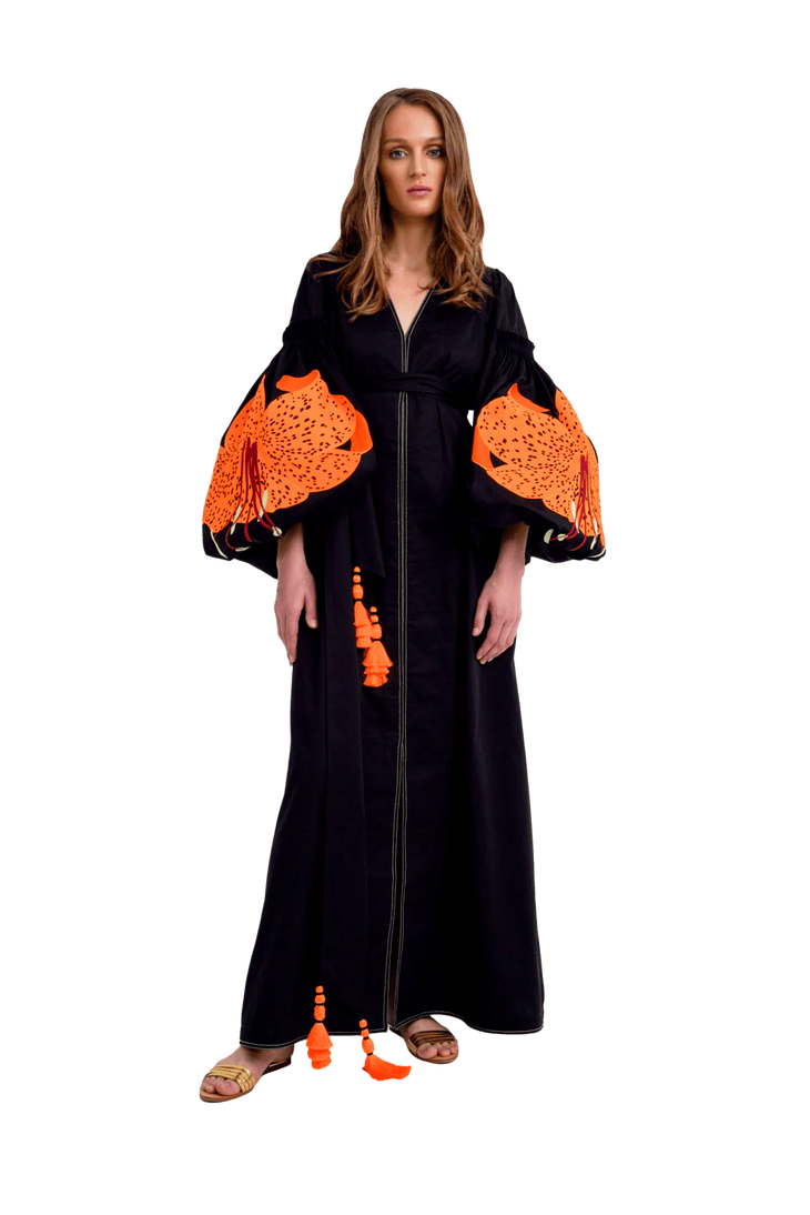Black cotton caftan maxi dress with vibrant orange embroidered lily sleeves and tassel details — Yuliya Magdych | Endless UAE