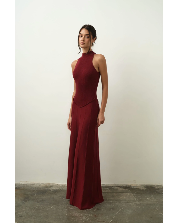 Elegant burgundy sleeveless maxi dress with ribbed bodice and flowing skirt — Nora The Label | Endless UAE