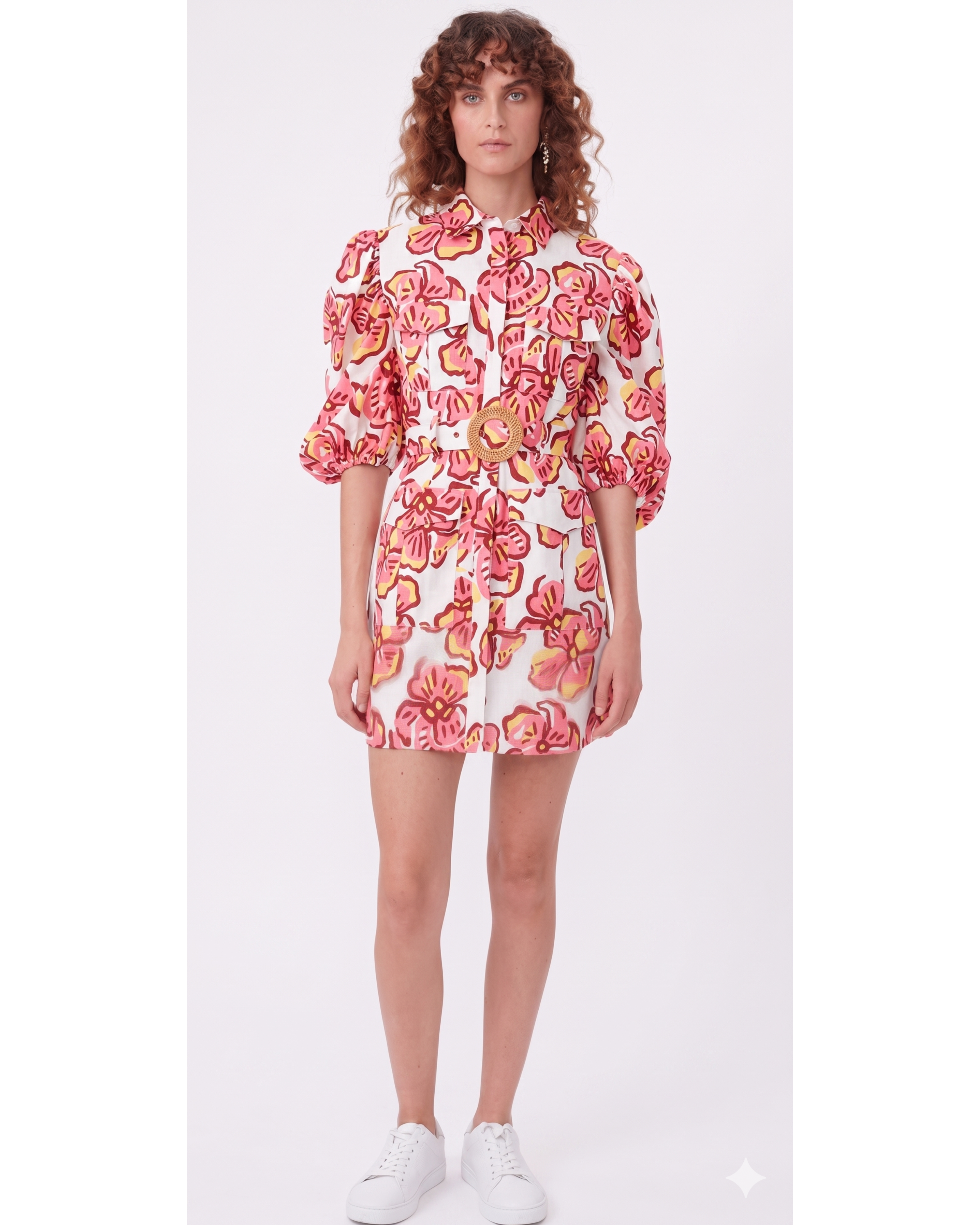 Woman wearing Explorer Mini Dress with pink floral print, puff sleeves, and gold belt — Torannce | Endless UAE