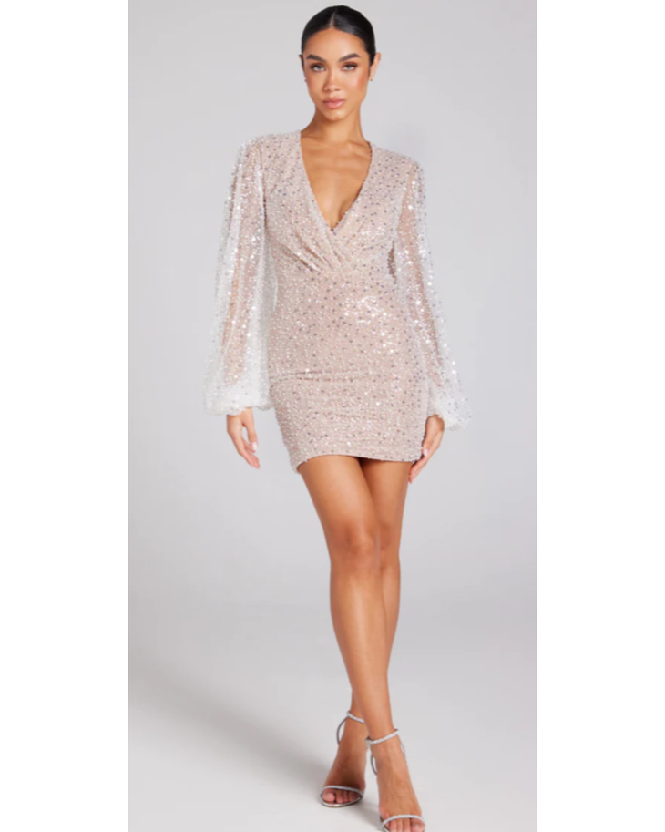 Woman wearing beaded champagne mini dress with draped long sleeves — Nadine Merabi | Endless UAE
