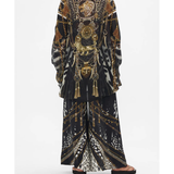 Ornate black and gold patterned co-ord set with chain and animal print details — Camilla | Endless UAE