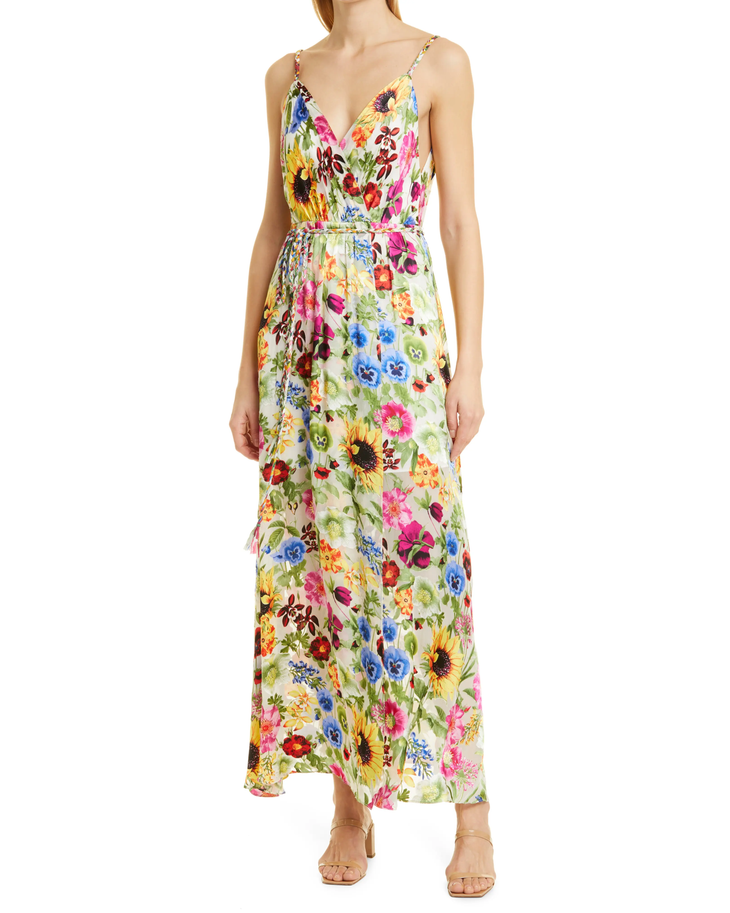 Woman wearing a colorful floral faux wrap maxi dress with sunflowers and pink flowers — Alice & Olivia | Endless UAE