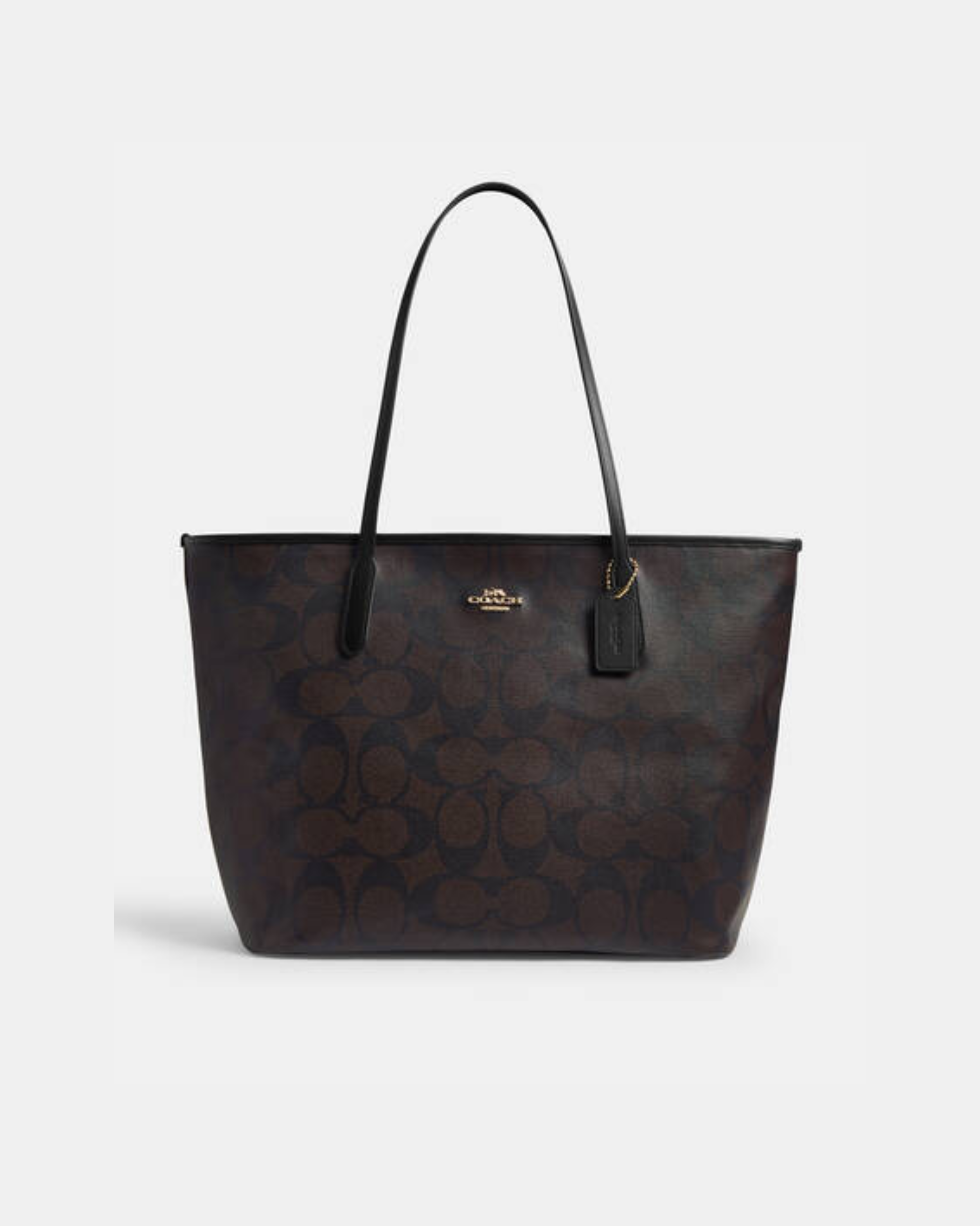 Black leather tote bag with dual handles and Coach branding — Coach | Endless UAE