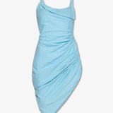 Woman wearing light blue draped mini dress with matching clutch and platform sandals — Jacquemus | Endless UAE