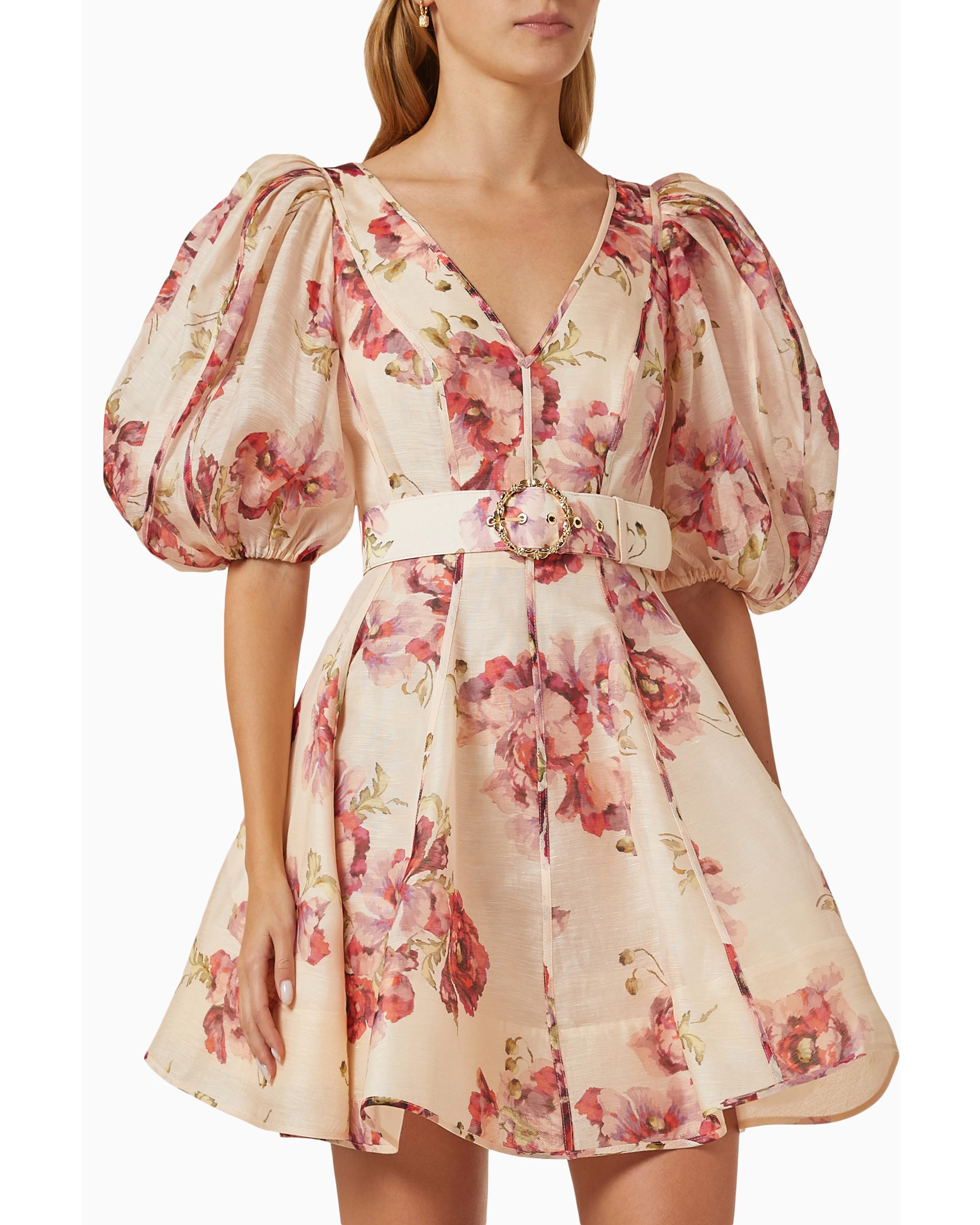 Woman wearing a cream linen mini dress with pink floral print, puff sleeves, and belted waist — ZIMMERMANN | Endless UAE