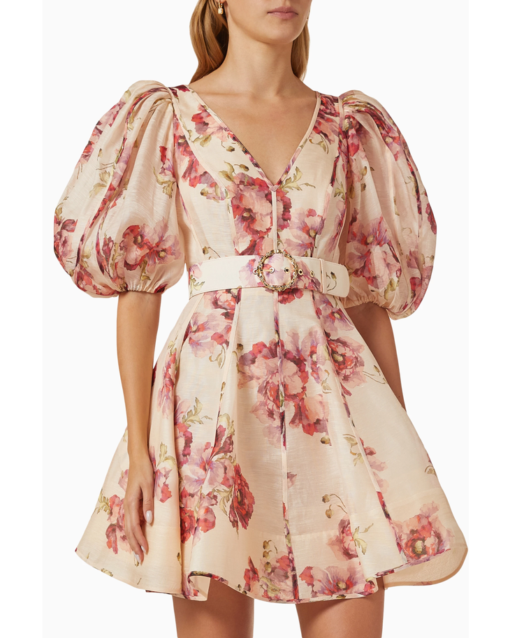 Woman wearing a cream linen mini dress with pink floral print, puff sleeves, and belted waist — ZIMMERMANN | Endless UAE