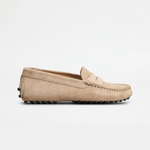 Beige suede junior driving loafer with black rubber sole and stitched detailing — Tod's | Endless UAE