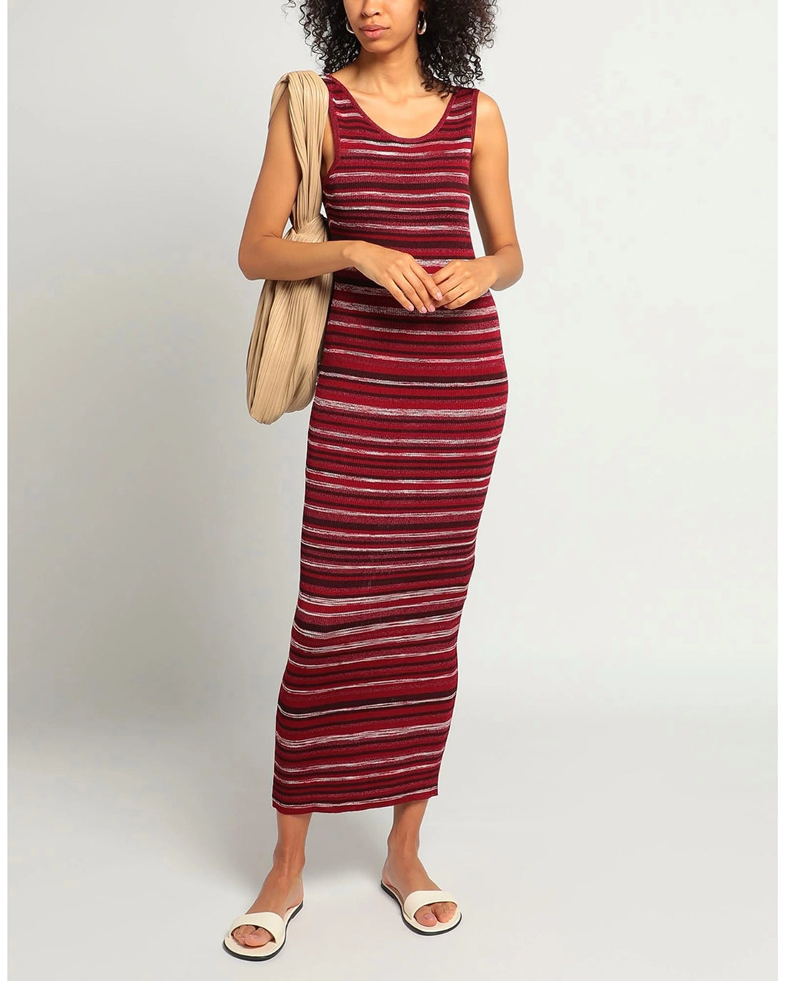 Striped knit midi dress in burgundy with beige shoulder bag and white slides — Missoni | Endless UAE