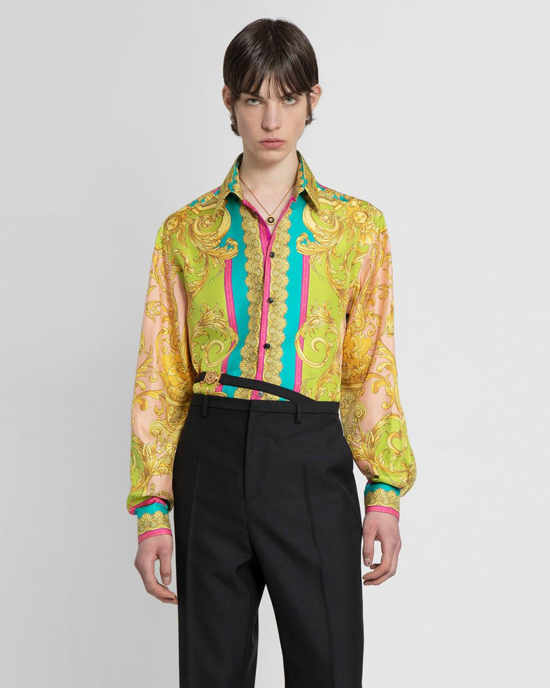 Woman wearing Barocco Goddess silk shirt in yellow with baroque print and colorful placket — Versace | Endless UAE
