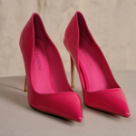 Hot pink pointed-toe stiletto heels with high heels on beige surface — Subashini Heels | Endless UAE