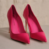 Hot pink pointed-toe stiletto heels with high heels on beige surface — Subashini Heels | Endless UAE