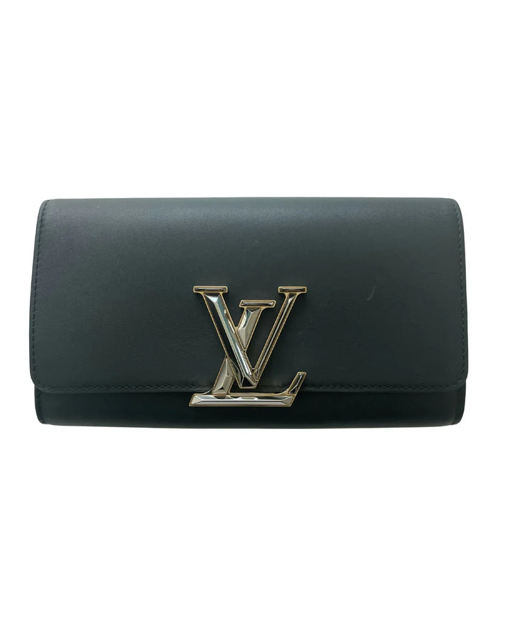 Dark green leather clutch bag with gold LV logo hardware — Louis Vuitton | Endless UAE