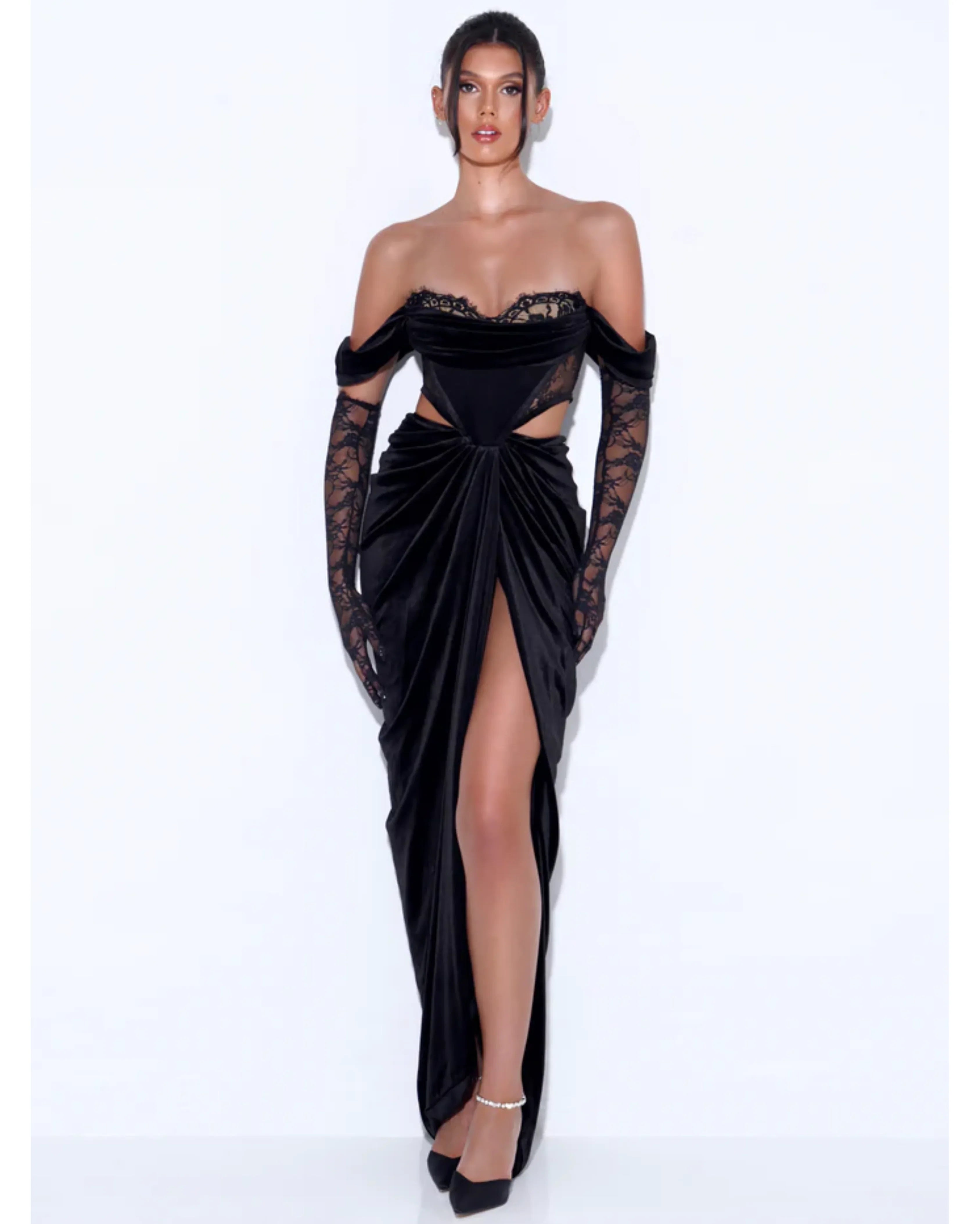 Elegant black velvet off-shoulder gown with lace corset detail and high slit — Miss Circle | Endless UAE