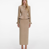 Woman wearing a beige knit midi dress with crystal trim detailing and matching cropped jacket — Self-Portrait | Endless UAE