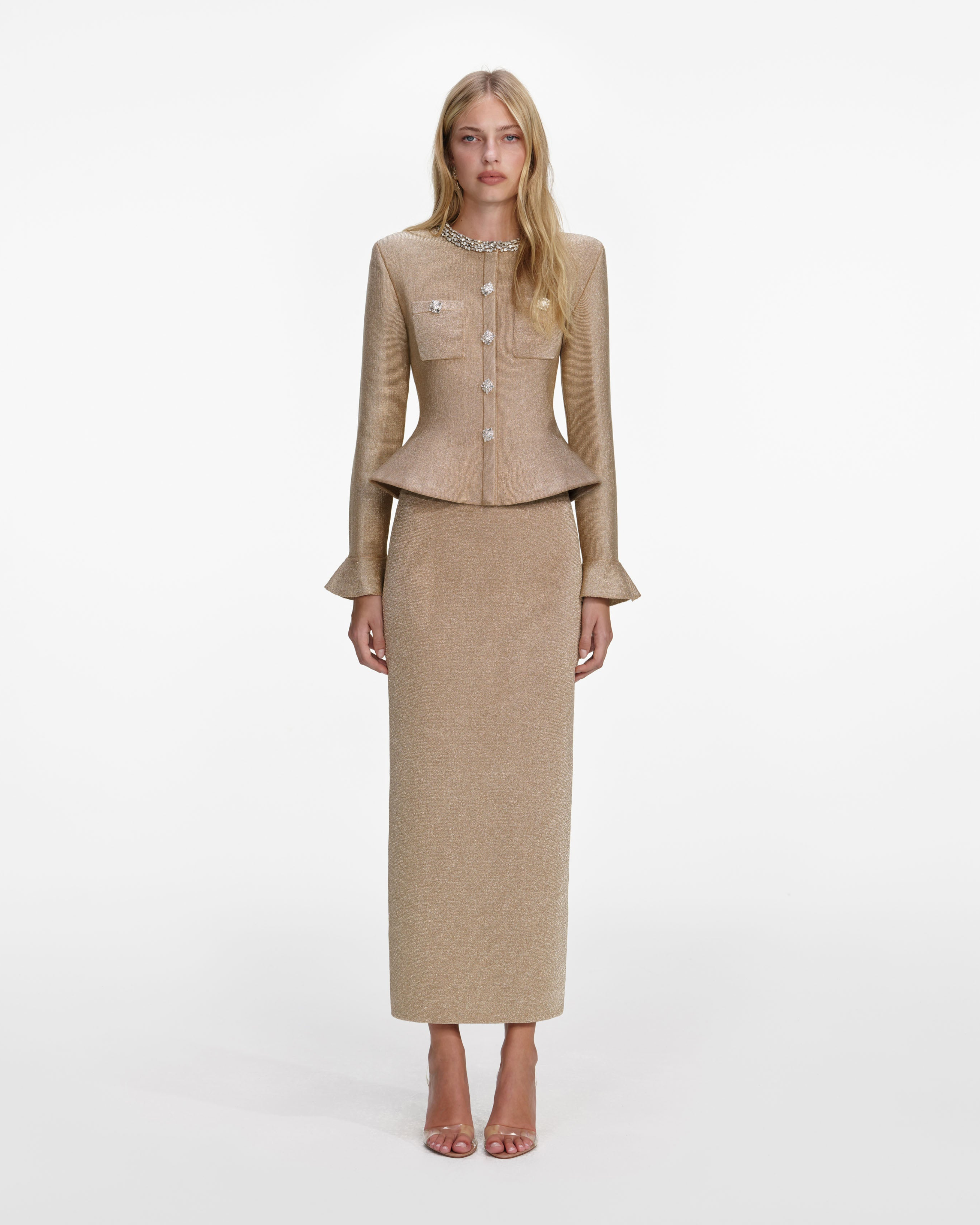 Woman wearing a beige knit midi dress with crystal trim detailing and matching cropped jacket — Self-Portrait | Endless UAE