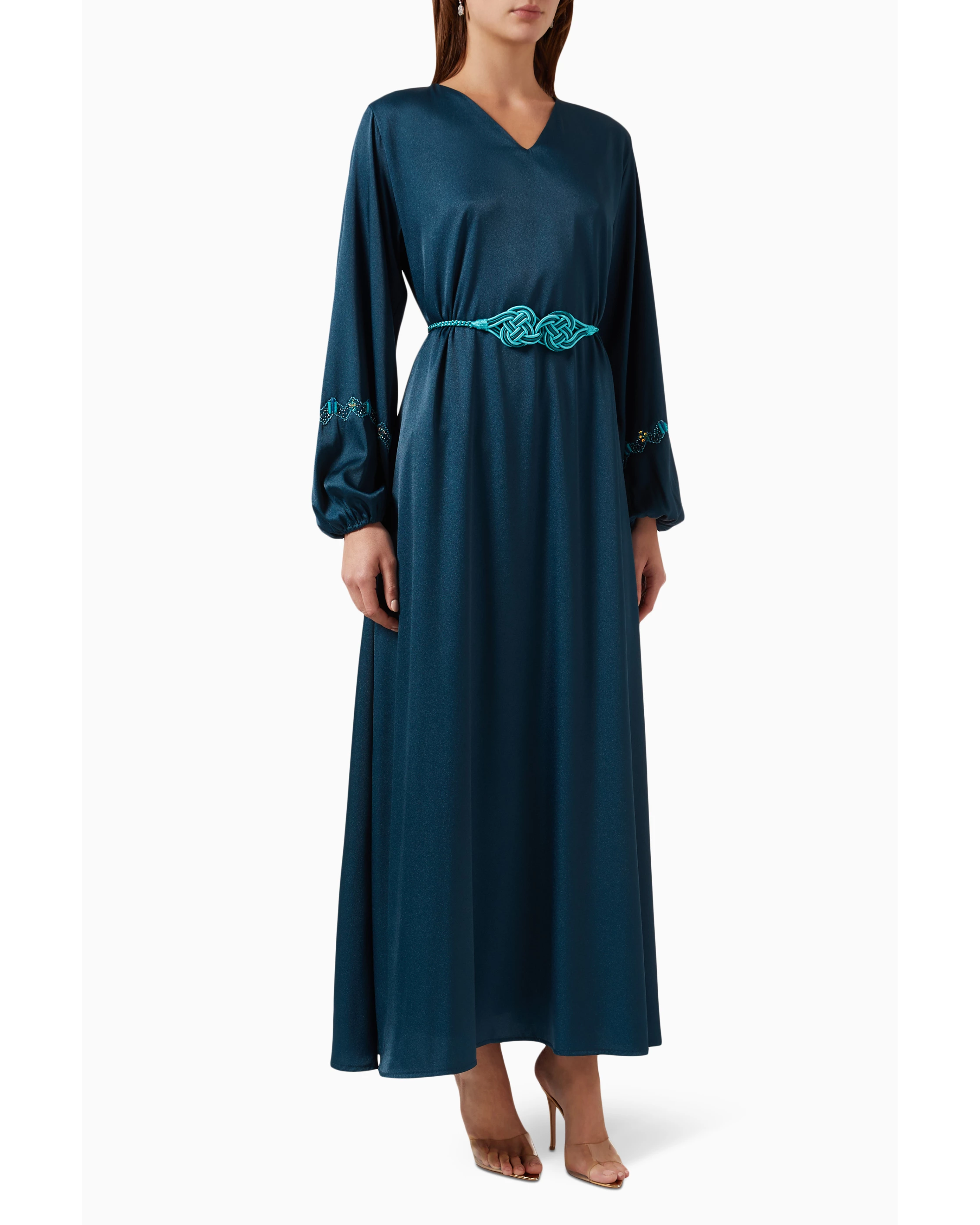Teal long sleeve kaftan dress with embroidered belt and sleeve details on model — Nass | Endless UAE
