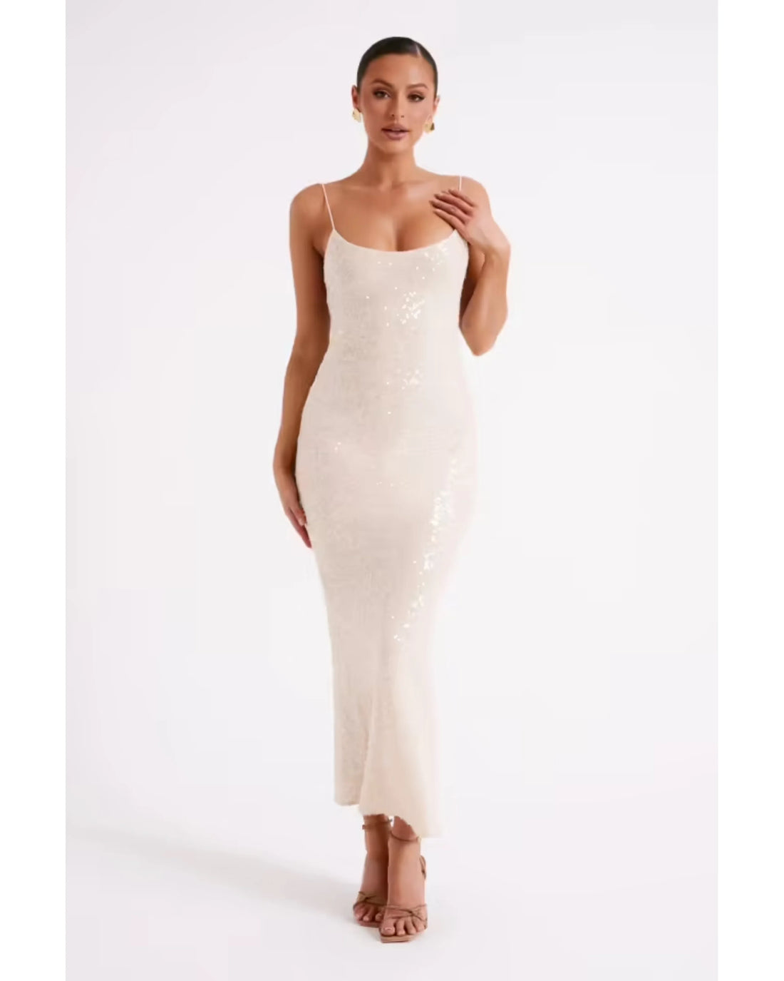 Woman wearing cream sequin maxi dress with thin straps and ankle length — Meshki | Endless UAE