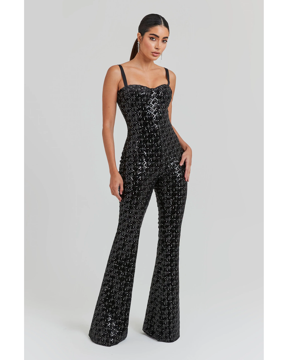Black sequin bustier jumpsuit with flared legs and thin straps — Nadine Merabi | Endless UAE