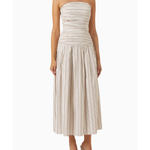 Woman wearing beige and white striped strapless midi dress with pleated skirt — Anna Quan | Endless UAE