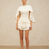 Lyna White Satin Dress with draped cape overlay and tiered skirt — Miss Rosier | Endless UAE