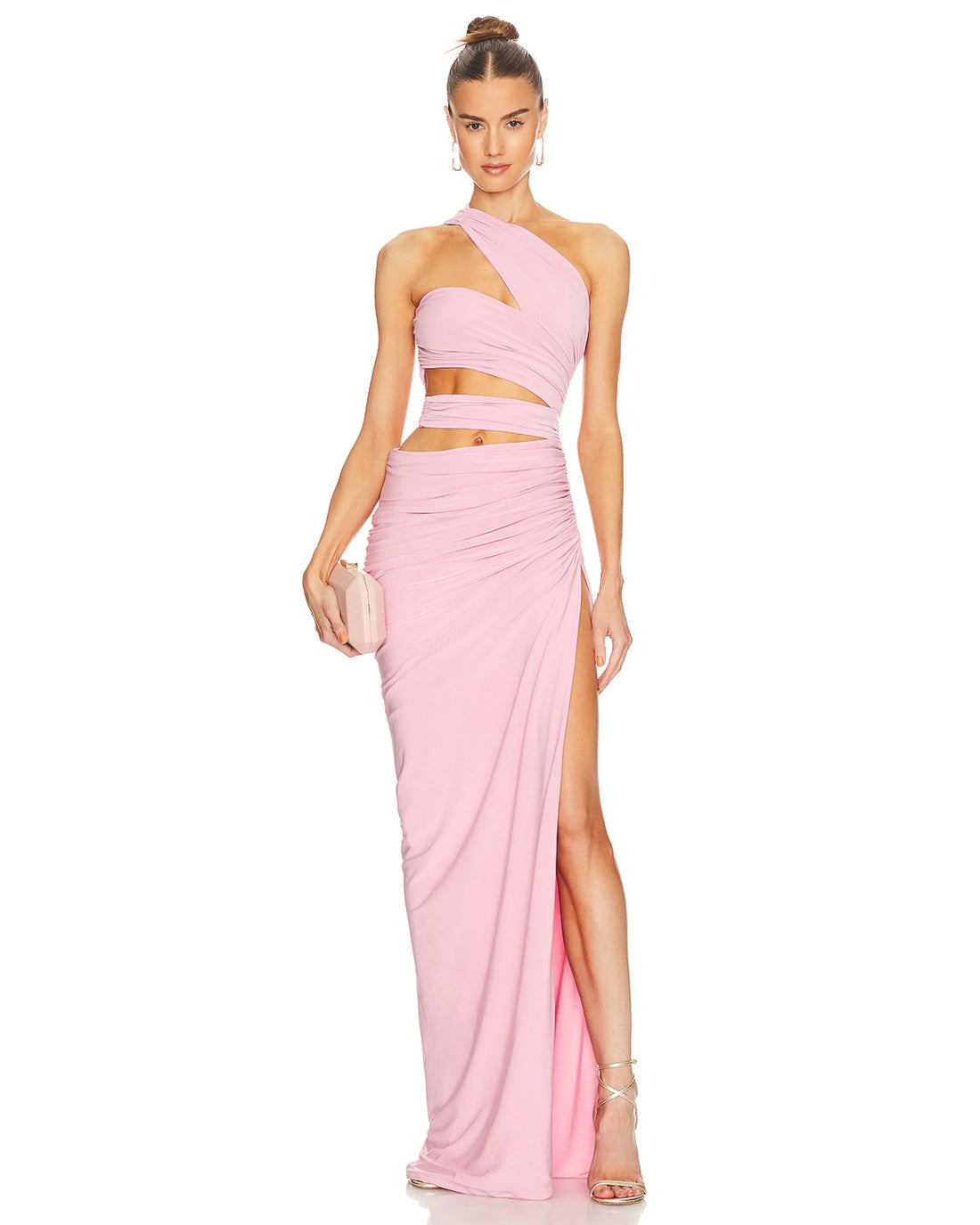 Woman wearing pink Cassia Dress with asymmetrical neckline, cutout details, and high slit — J.Angelique | Endless UAE