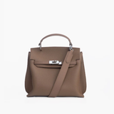 Brown leather structured handbag with gold hardware and pink shoulder strap — Endless | Endless UAE