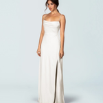 Elegant ivory satin slip gown with cowl neckline, thin straps, and high slit, full-length silhouette — Fame & Partners | Endless UAE