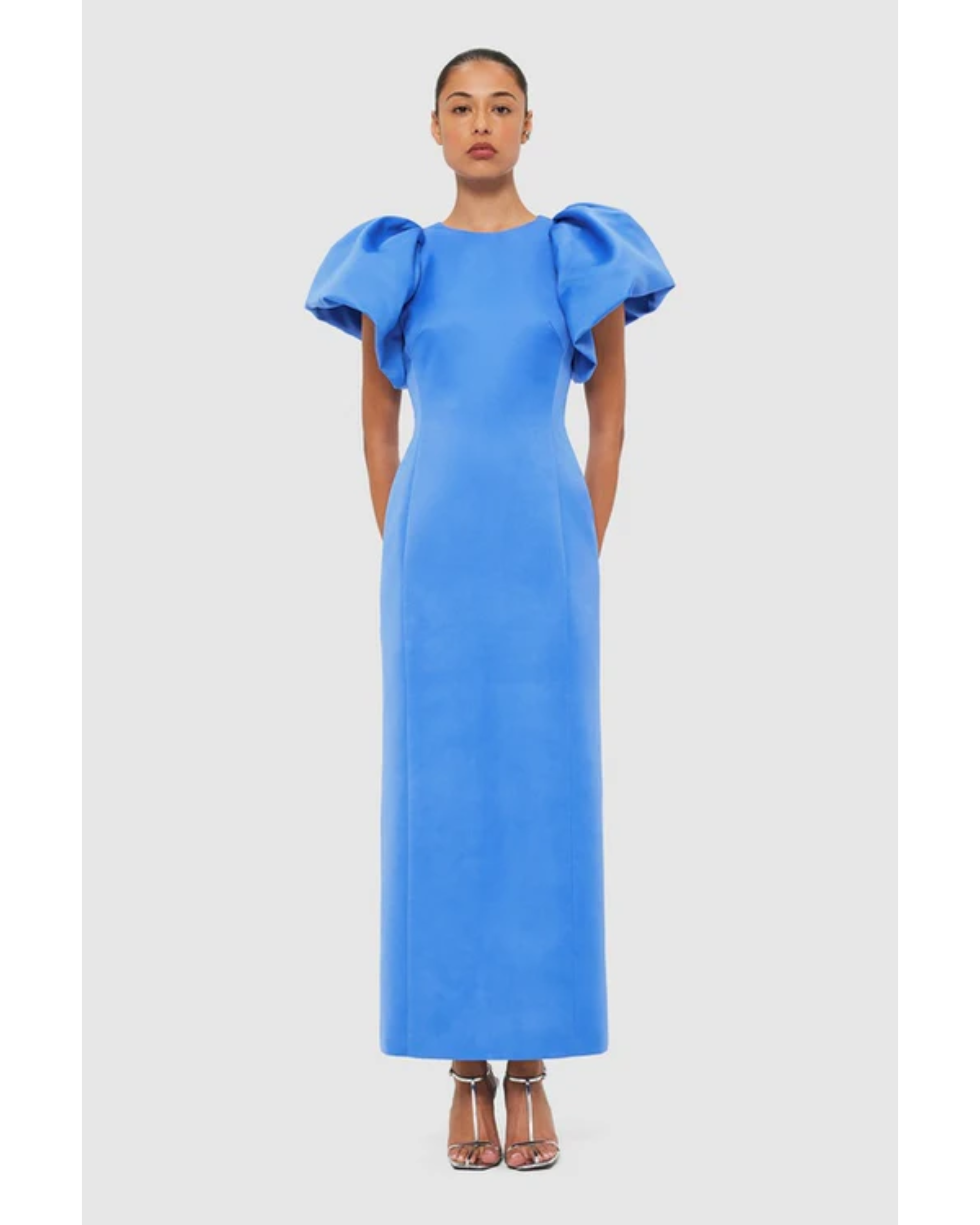 Woman wearing steel blue Lucinda Maxi Dress with puffed sleeves, viewed from back — Leo Lin | Endless UAE