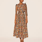 Woman wearing Guaguanco Midi Dress in colorful floral print with 3/4 sleeves — Agua By Agua Bendita | Endless UAE