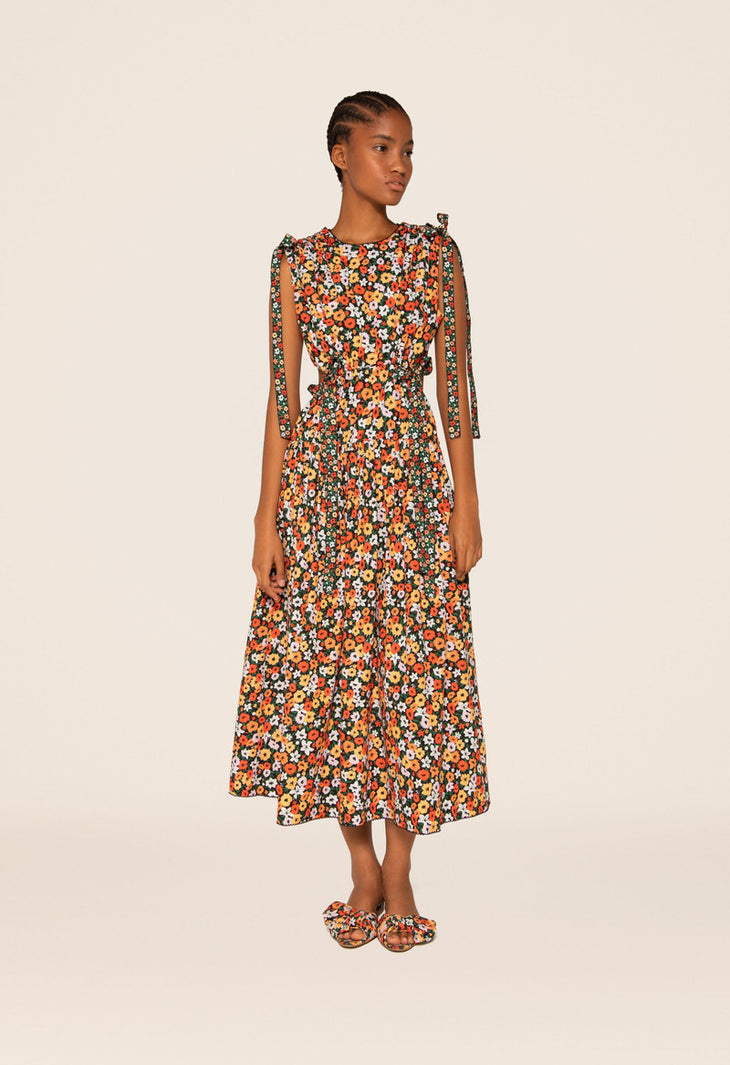 Woman wearing Guaguanco Midi Dress in colorful floral print with 3/4 sleeves — Agua By Agua Bendita | Endless UAE