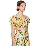 Dolce and Gabbana floral print crop top and high-waisted skirt set with yellow flowers and green leaves — Dolce and Gabbana | Endless UAE