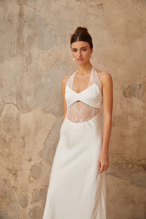 White satin maxi dress with halter neckline and lace panel cutout detail — Miss Rosier | Endless UAE