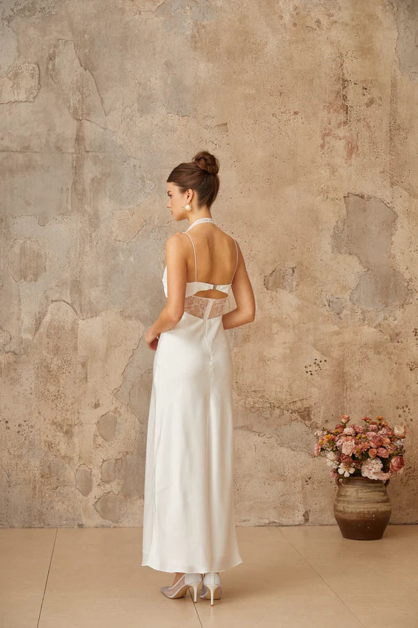White satin maxi dress with halter neckline and lace panel cutout detail — Miss Rosier | Endless UAE