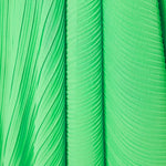Bright green pleated asymmetric maxi dress with white belt and puff sleeves — Solace London | Endless UAE