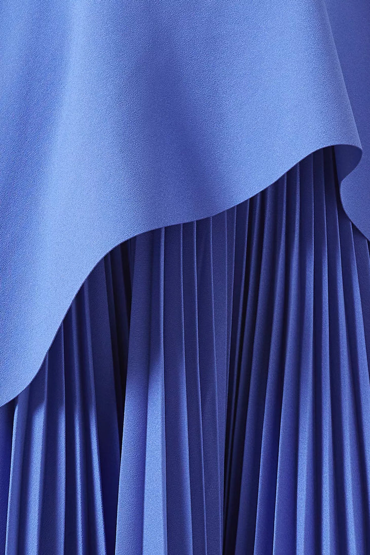 Pleated periwinkle blue midi dress with asymmetric overlay detail — Solace London | Endless UAE