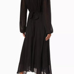 Black maxi dress with gold sunburst embellishment and flowing bell sleeves — RIXO | Endless UAE