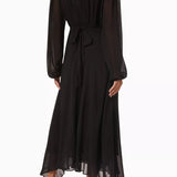 Black maxi dress with gold sunburst embellishment and flowing bell sleeves — RIXO | Endless UAE