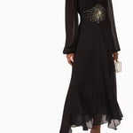 Black maxi dress with gold sunburst embellishment and flowing bell sleeves — RIXO | Endless UAE