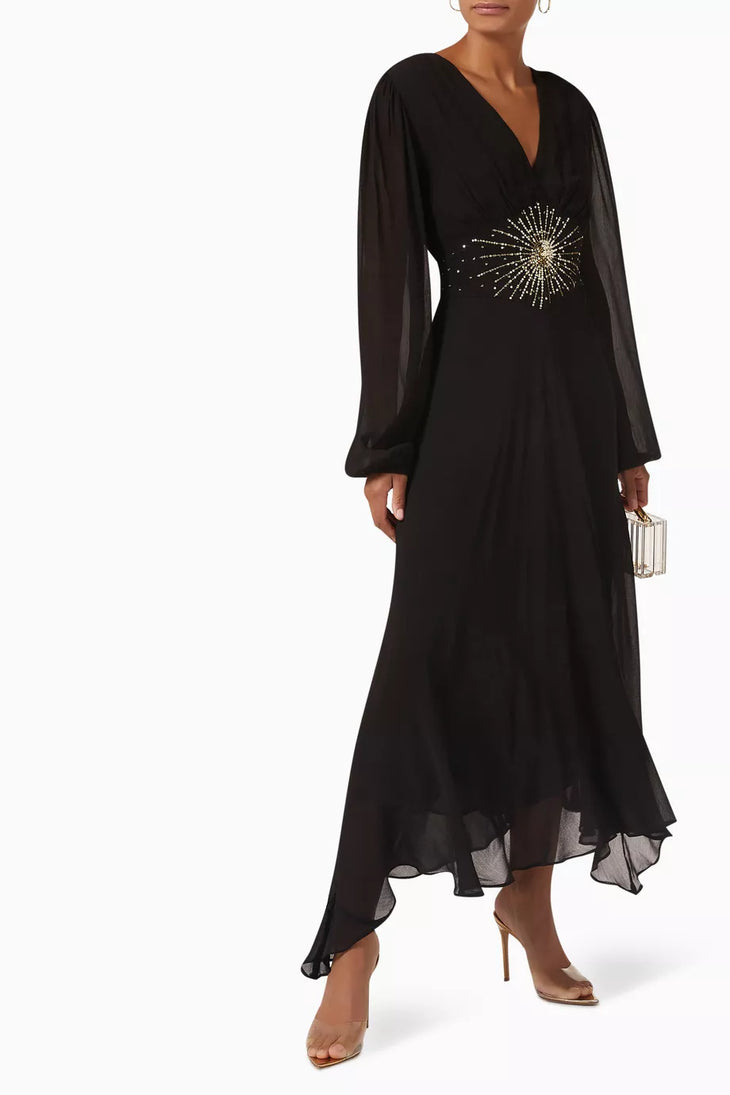 Black maxi dress with gold sunburst embellishment and flowing bell sleeves — RIXO | Endless UAE