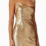 Gold sequinned mini dress with thin straps and cowl neckline on model — Suboo | Endless UAE